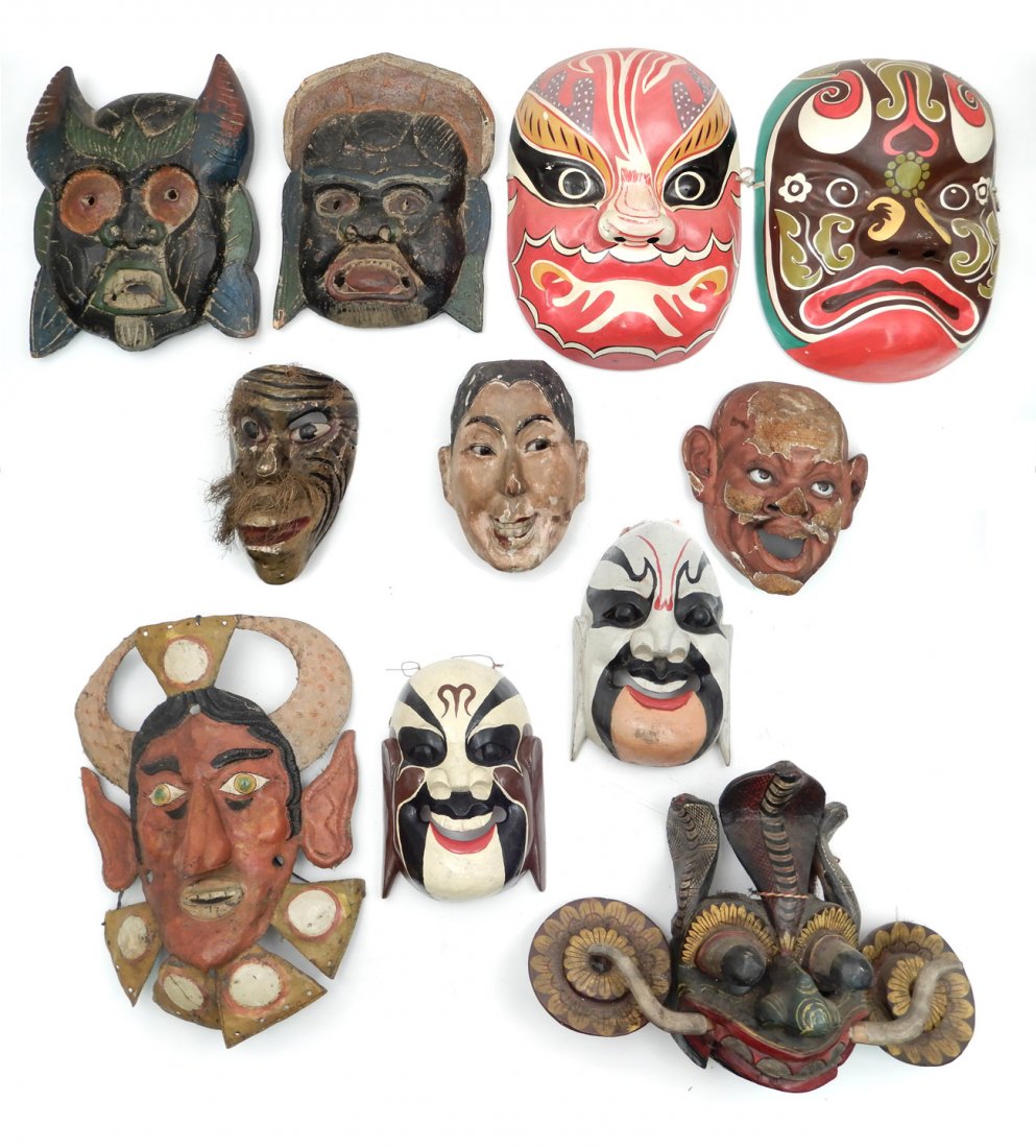 Grouping of ethnic and Asian masks, eleven pieces: Grouping of ethnic and Asian masks, eleven pieces, painted wood, painted papier mache, painted tin and composition, two with glass eyes, largest measures 16"