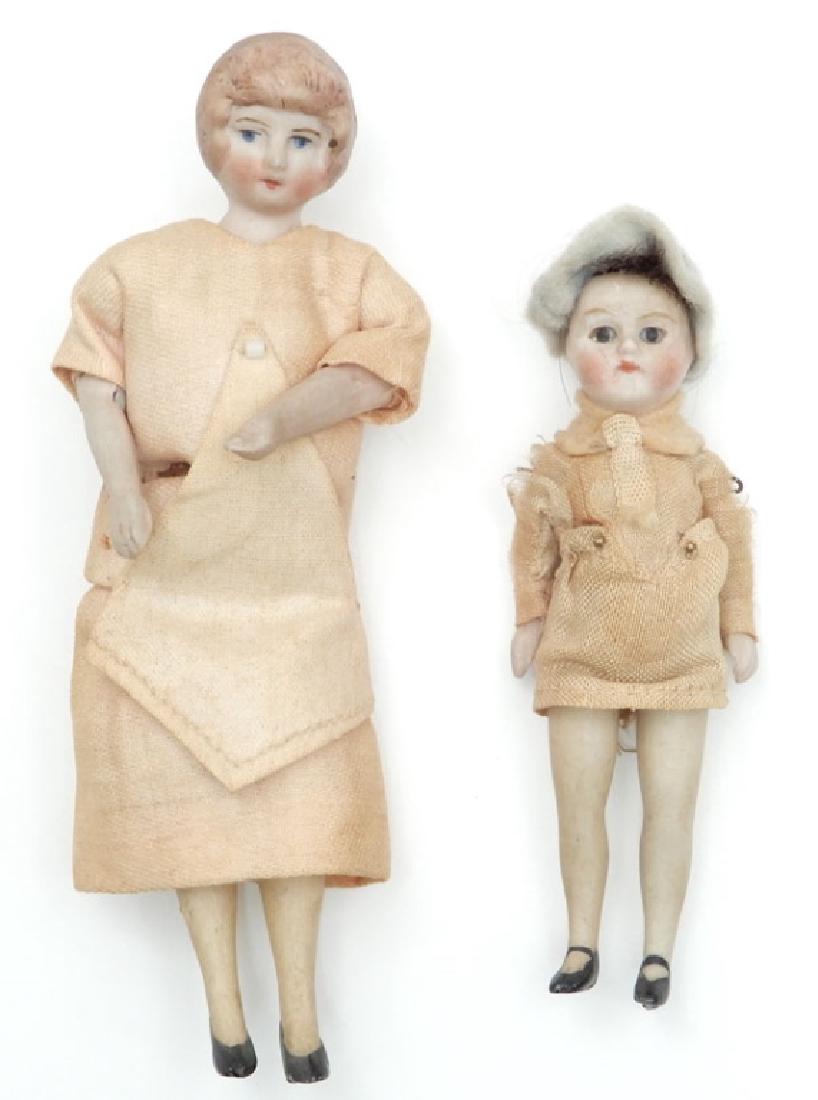 Two miniature all bisque dolls (1 of 4)
