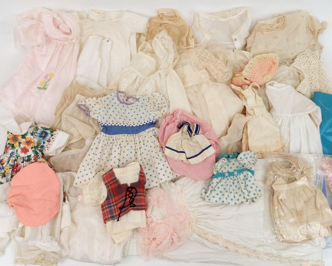 Large collection of antique and vintage doll clothes: Large collection of antique and vintage doll clothes, including whites, various sizes