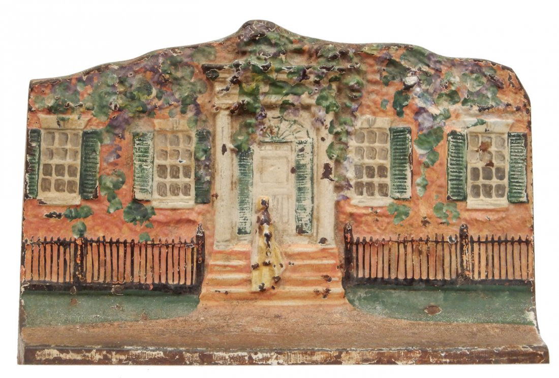 Cast iron doorstop Cottage with Woman on steps (1 of 2)