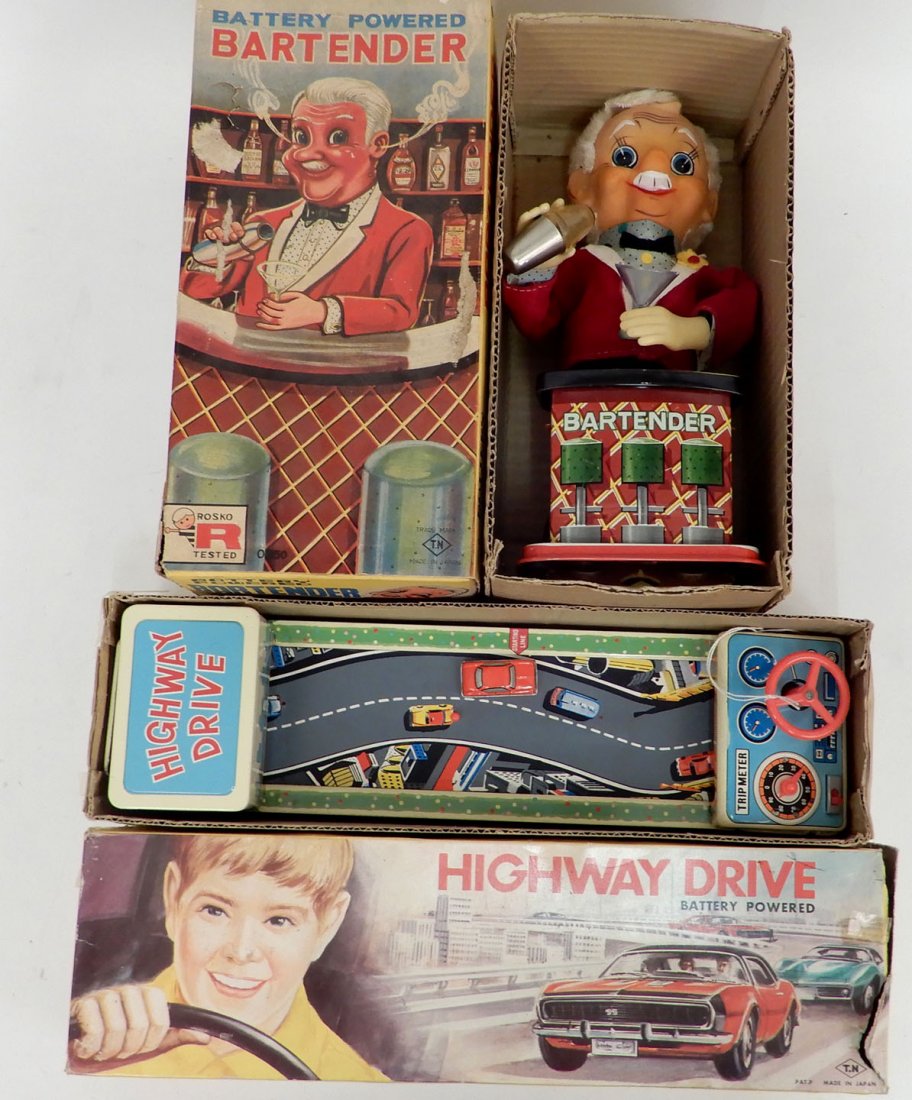 Two battery operated toys in boxes: Two battery operated toys in boxes, includes Bartender by Rosko, 0350, Made in Japan, box measures 12 1/2" x 6 1/4" x 5 3/4", and Highway Drive, Made in Japan, box measures 3 5/8" x 16" x 4 5/8"