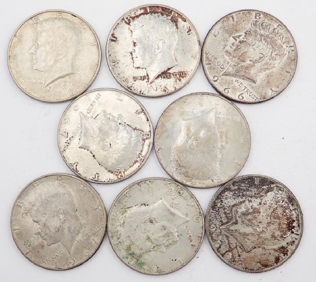 Eight silver Kennedy half dollars (1 of 1)