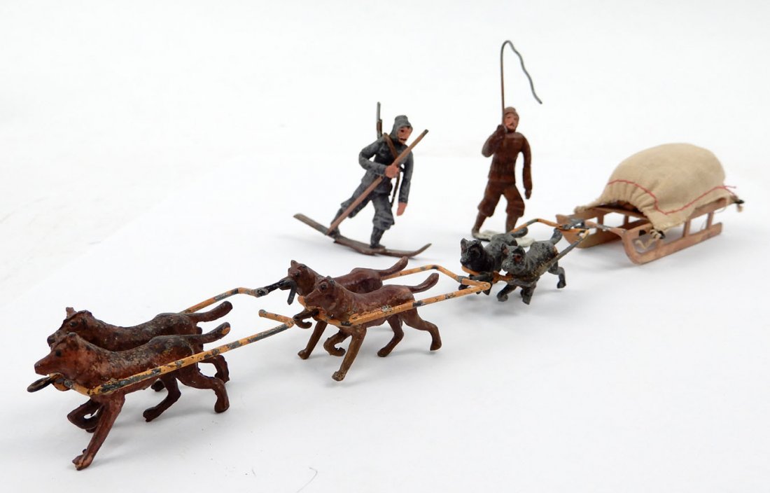 Dog Sled with harnessed dogs, driver with whip, and a s (1 of 7)