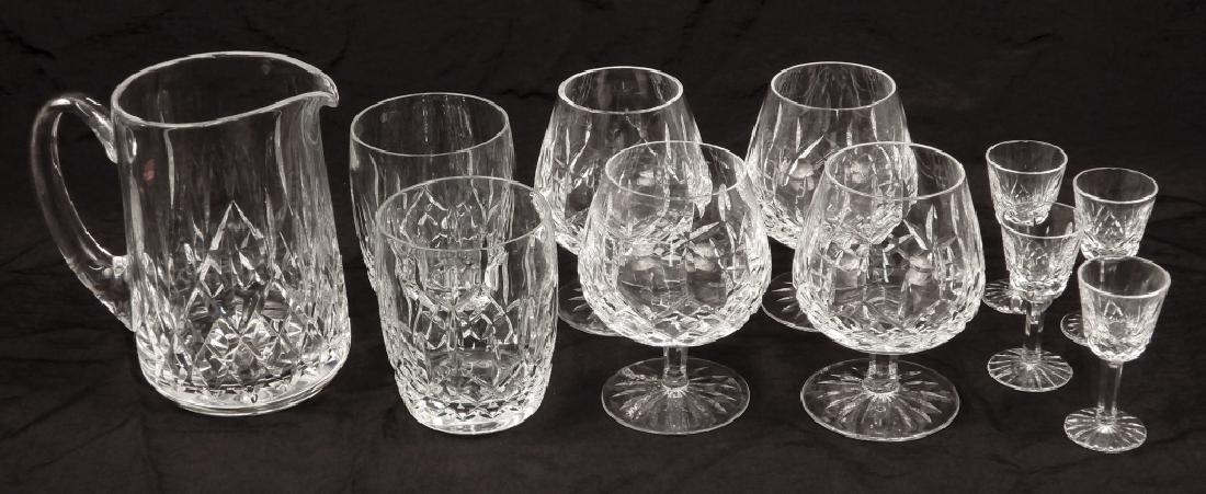 Grouping of Waterford crystal Lismore glasses: Grouping of Waterford crystal Lismore glasses, eleven pieces total, includes four small liquor cocktail/cordials, 3 1/2", four brandy glasses, 5 1/4", two rounded tumblers, 4 3/8", and a pitcher, 6 1/