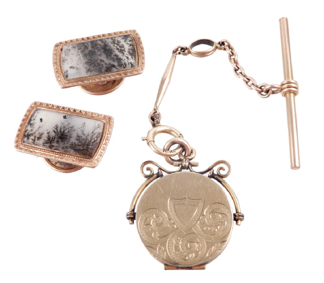 Gold Victorian cufflinks and watch fob: Gold Victorian cufflinks and watch fob, 14k rose gold and agate cufflinks, 3/4" long x 1/2" wide; gold filled fob with locket, 1" in diameter, 2 1/2" long 10k gold chain with T bar, stamped 10k, total