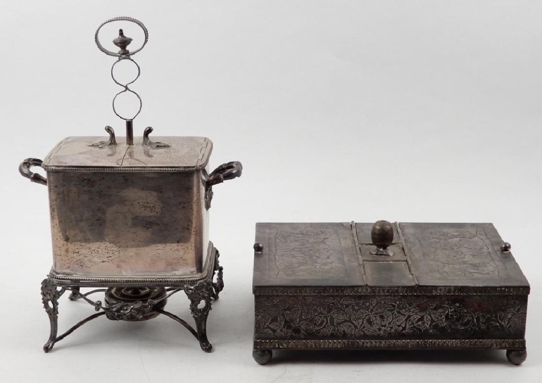 Meriden silver plated humidor and silver plated egg: Meriden silver plated humidor and a silver plated egg coddler, Meriden B. Company humidor with lid on either side, center row with handle has one lid that opens (other side is not opening) five dancin