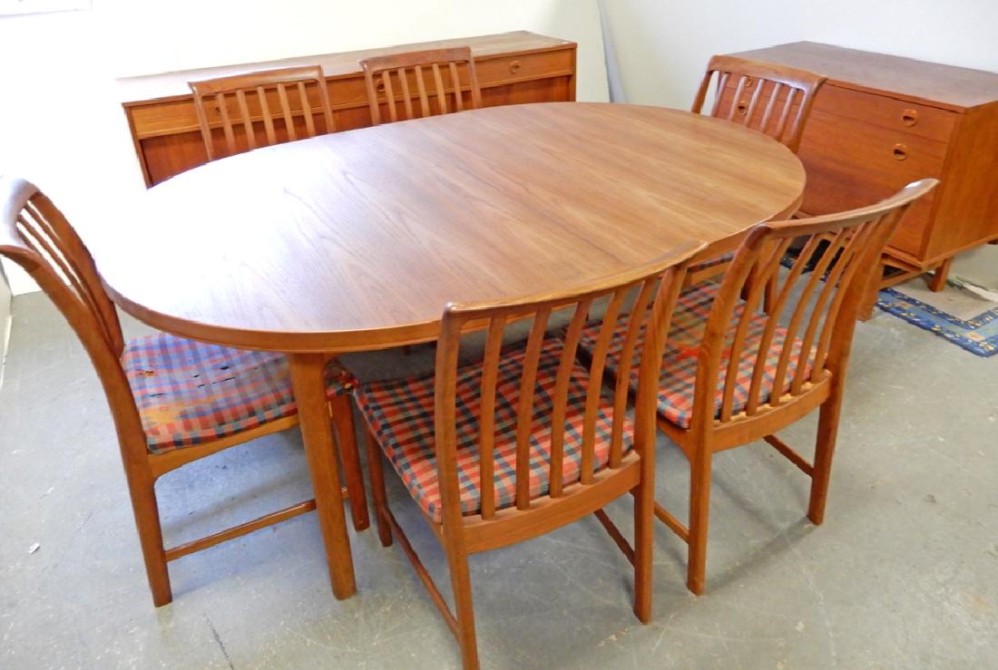 Dux walnut mid C. dining room set: Dux walnut mid C. dining room set, nine piece, with three leaves, Dux brand mark, chairs 34 1/2" high, table 28 1/2" x 68 1/2" x 48", server 31" x 38" x 18 1/2", buffet 31" x 71" x 18 1/2" leaves 22"*