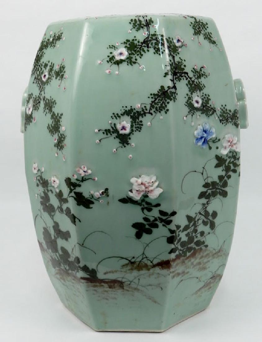 Chinese celadon garden seat: Chinese celadon octagonal garden seat with bird, floral and foliate decoration, double handles, pierced design below handles, 18" x 13 1/2"