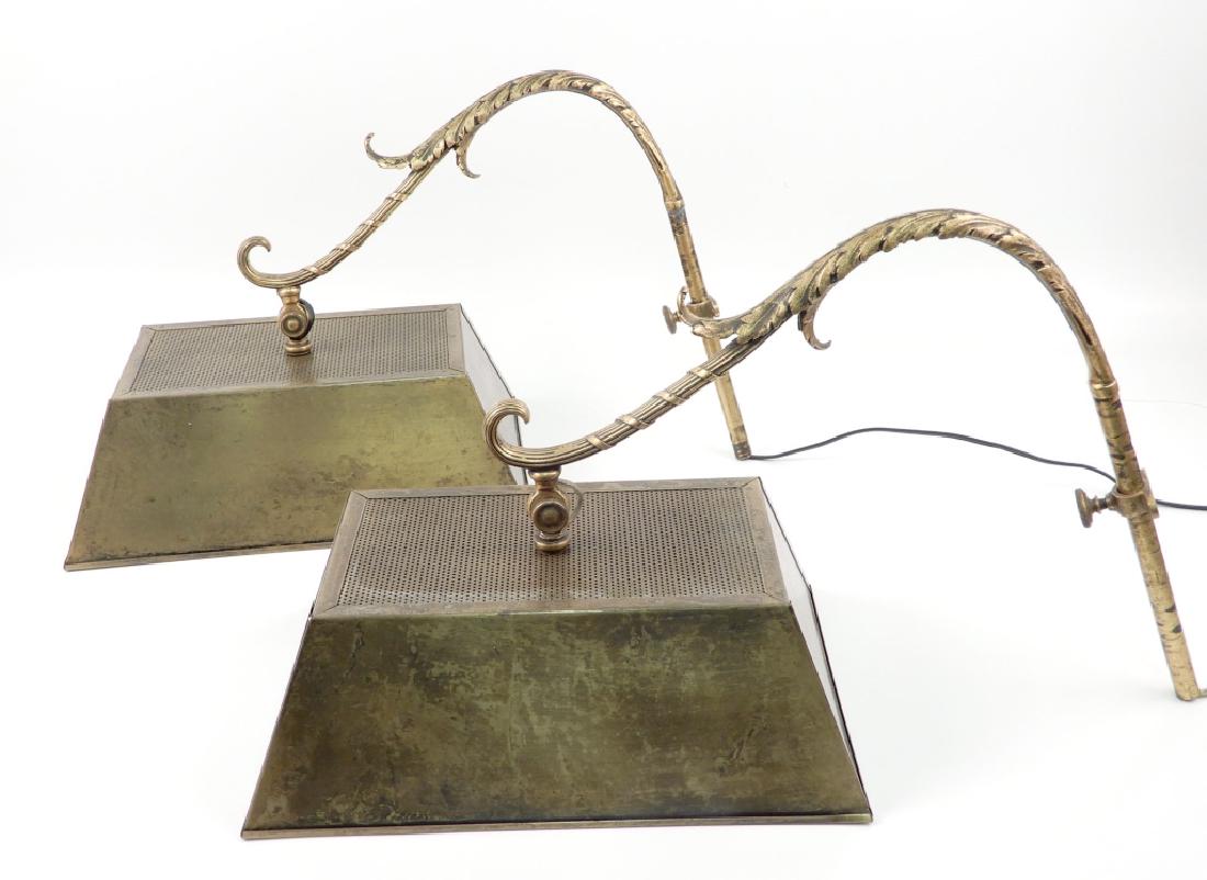 Pair of brass light fixtures: Pair of brass light fixtures, wall mount, adjustable swing arm with acanthus leaf decoration, rectangular brass shades, each with double sockets, 11" high to top of arm x 17" x 8 1/4"