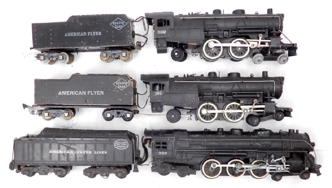 Three American Flyer locomotives and tenders: Three American Flyer locomotives and tenders, includes two No. 300 Reading Lines, and No. 326 New York Central System, longest measures 19"