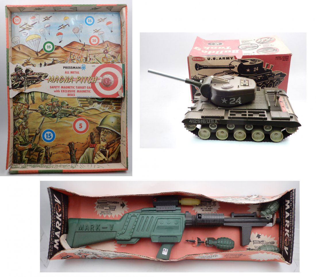 Three toys in original packaging, includes Remco Bulldo: Three toys in original packaging, includes Remco Bulldog tank, Pressman Magna Pitch, and Star Brite Toy Corp Mark-V Giant 36" Combination Gun, box measures 36" long