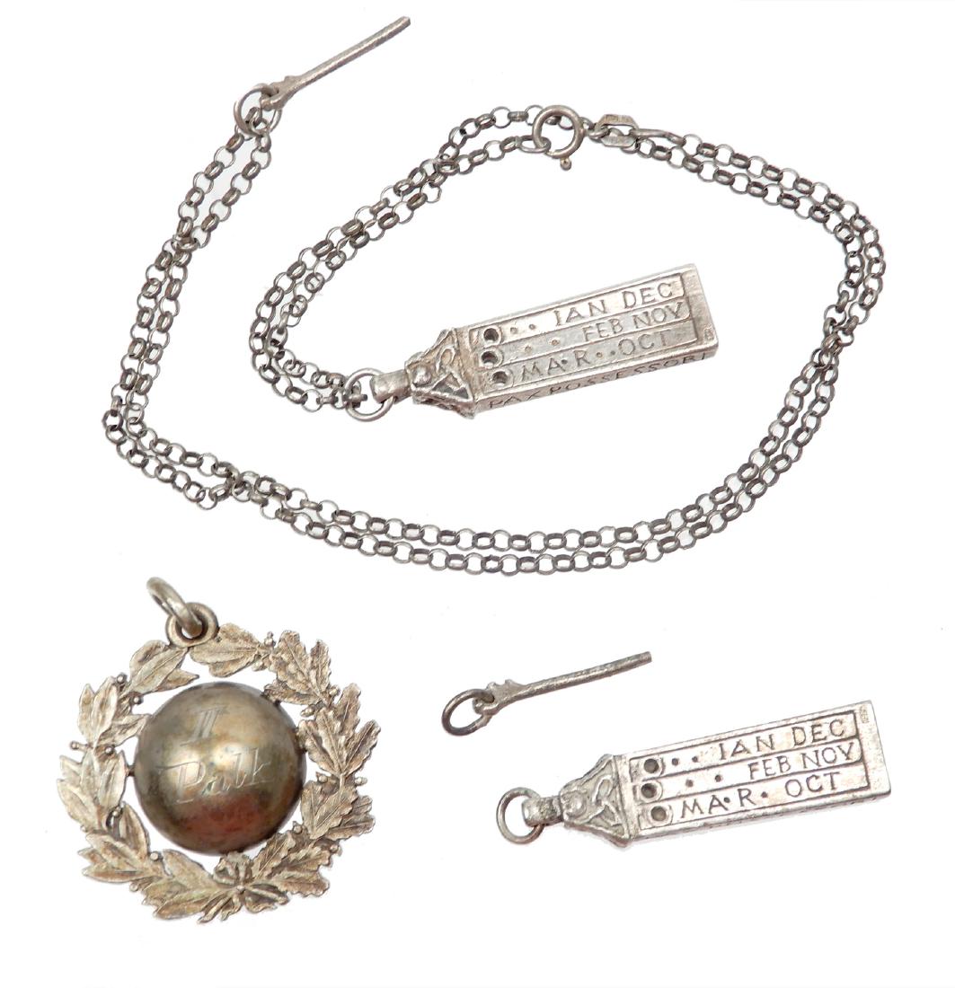 Two sterling silver replica sundials from The Ransome: Two sterling silver replica sundials from The Ransome gallery of London, reproduction of 950 AD Saxon pocket sundial in the form of a pendant, perimeter stamped "Salvs Factori Pax Possessori", (Health