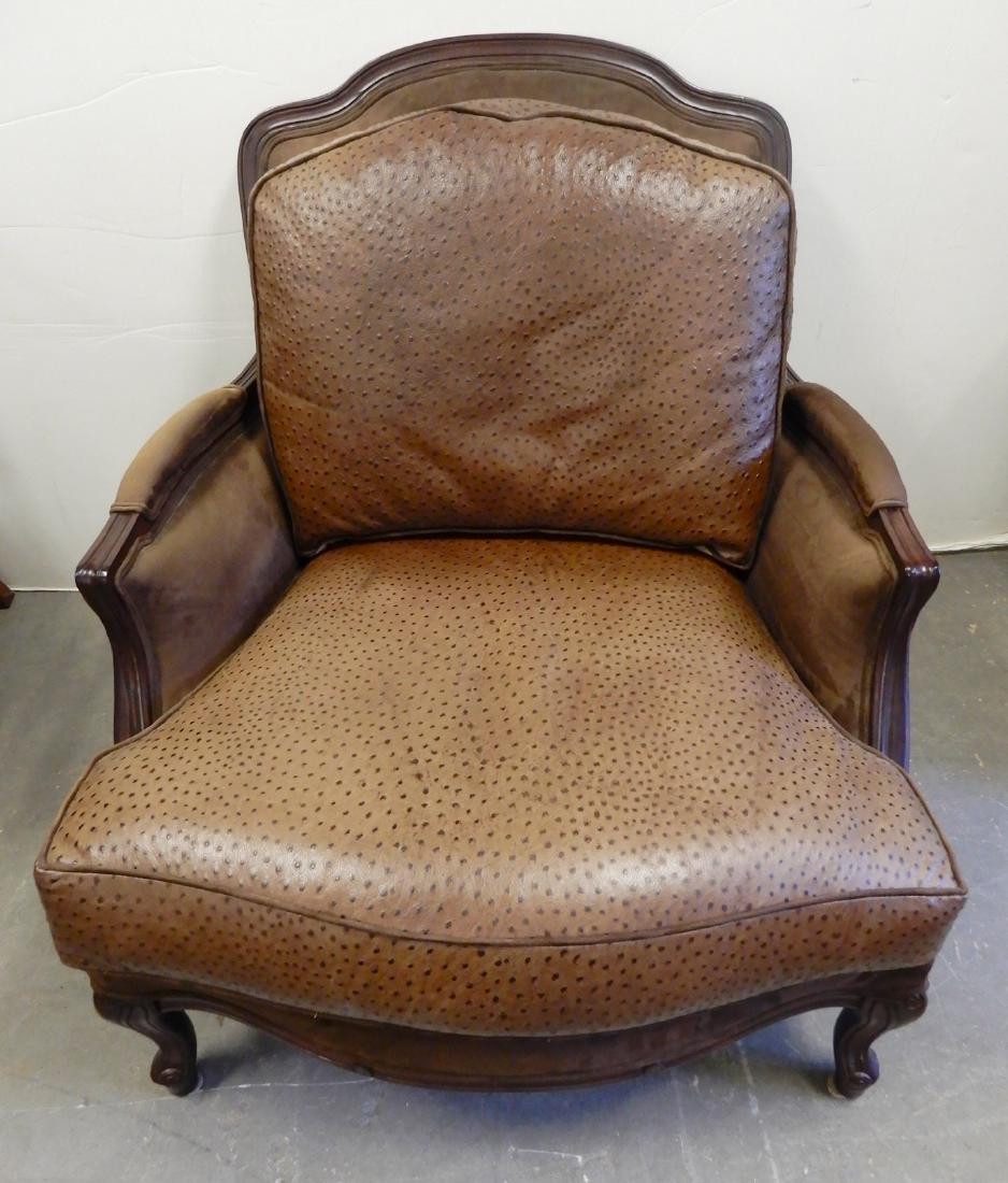 Ostrich leather upholstered mahogany bergere chair: Ostrich leather upholstered mahogany bergere chair, 35" x 33" x 30"