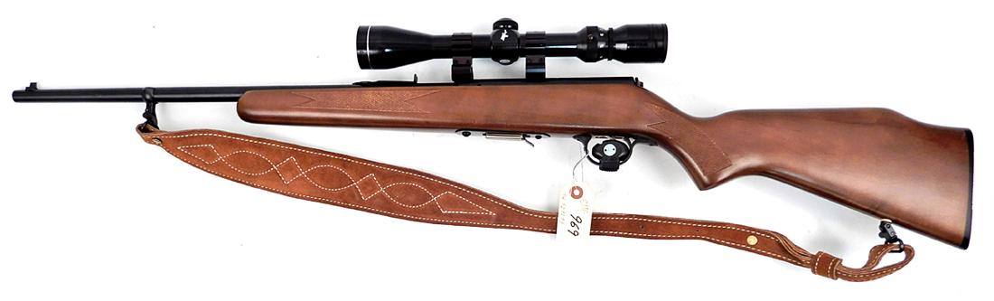 Savage .22 WMR Model 93 rifle: Savage .22 caliber WMR Model 93 rifle, bolt action, five shot, magazine feed, serial number 929299, with Tasco 3-9 x 40 scope, open sights and leather sling, barrel length 21", overall length 39 1/2",