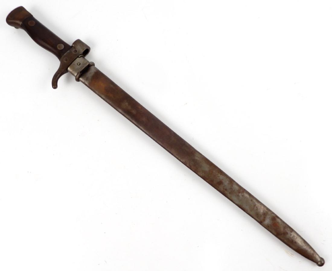 French M1892 Berthier 2nd model bayonet in scabbard: French M1892 Berthier 2nd model bayonet in scabbard, marked on ricasso VC in circles, numbered on guard 51739, number 7 on pommel, blade length 15 5/8", overall length 20 3/4"