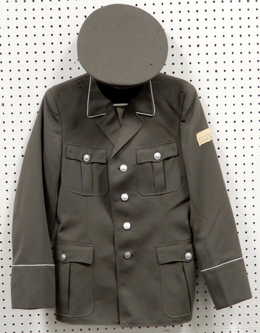 East German Officers jacket and visor cap: East German Officers jacket and visor cap, jacket tag g44, stamped inside NVA g44, 1850 2/L, and visor cap, marked NVA 58, 1856 H