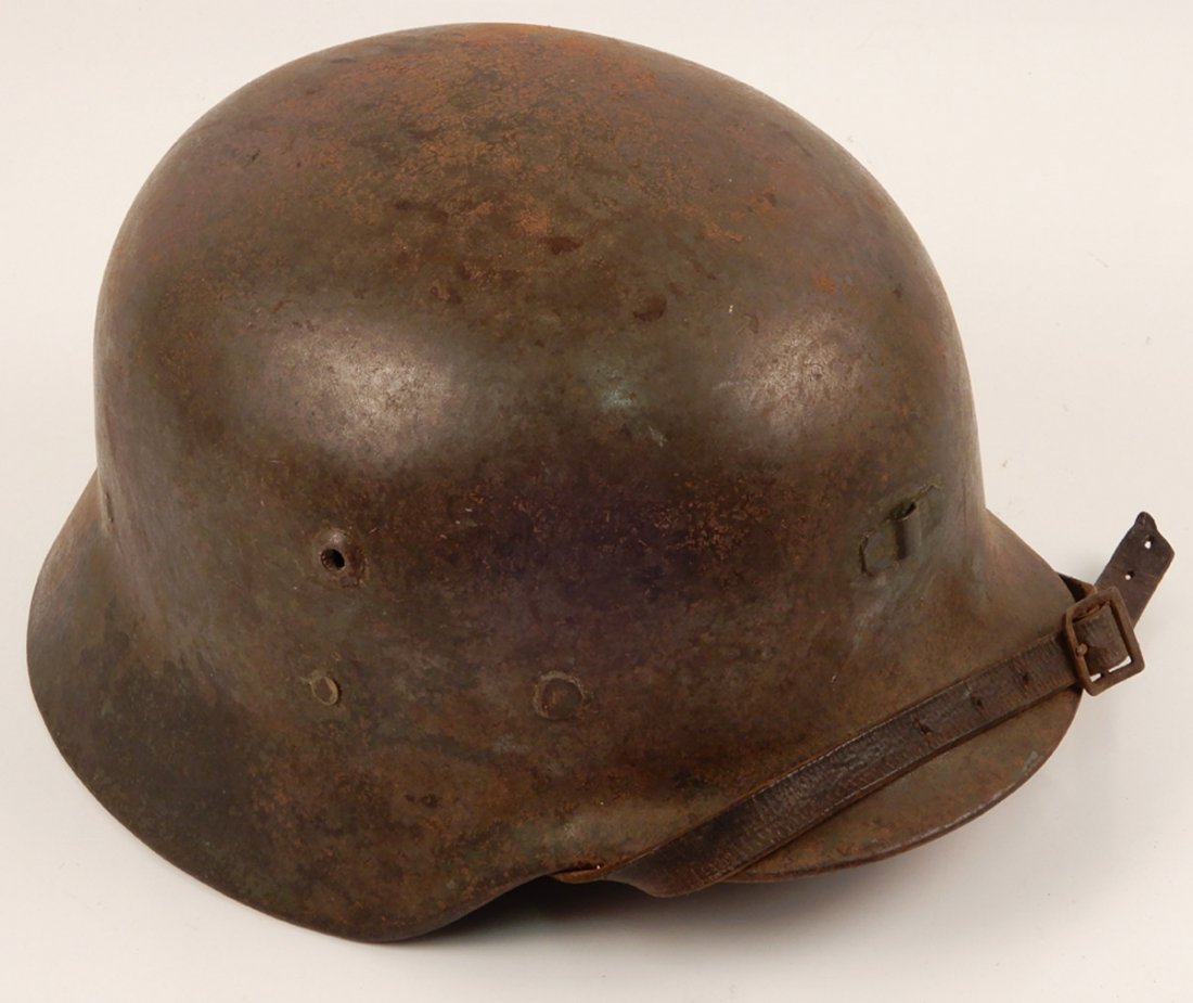 Spanish post war helmet: Spanish post war helmet, leather liner and chin strap, 6 1/4" x 9 1/4" x 11 3/8"