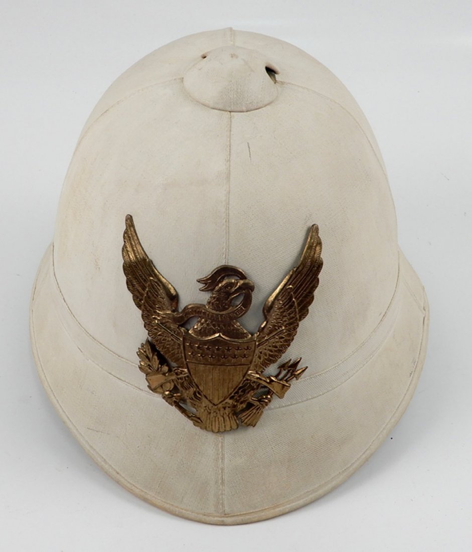 U.S. M1889 sun helmet: U.S. M1889 sun helmet, E. Pluribus Unum eagle and shield badge on front, size 7 1/2, R. Innes and Moowey written inside, 9 1/4" x 9 3/8" x 12"