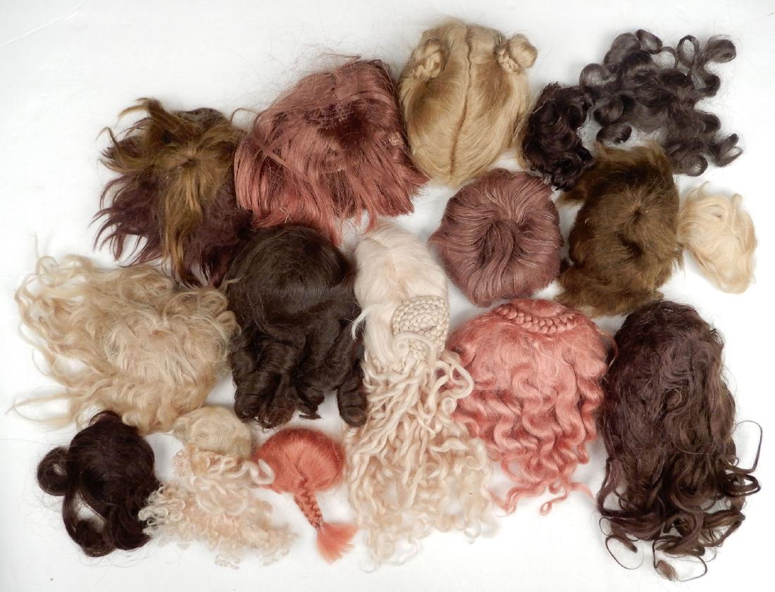 Grouping of antique and vintage doll wigs (1 of 1)