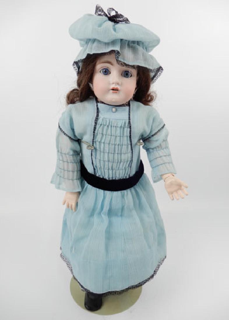 Kestner 154 bisque shoulder head doll: Kestner 154 bisque shoulder head doll, kid body, replaced composition arms, blue glass sleep eyes, painted upper and lower lashes, eyebrows, open mouth with upper teeth, accented lips, incised on head