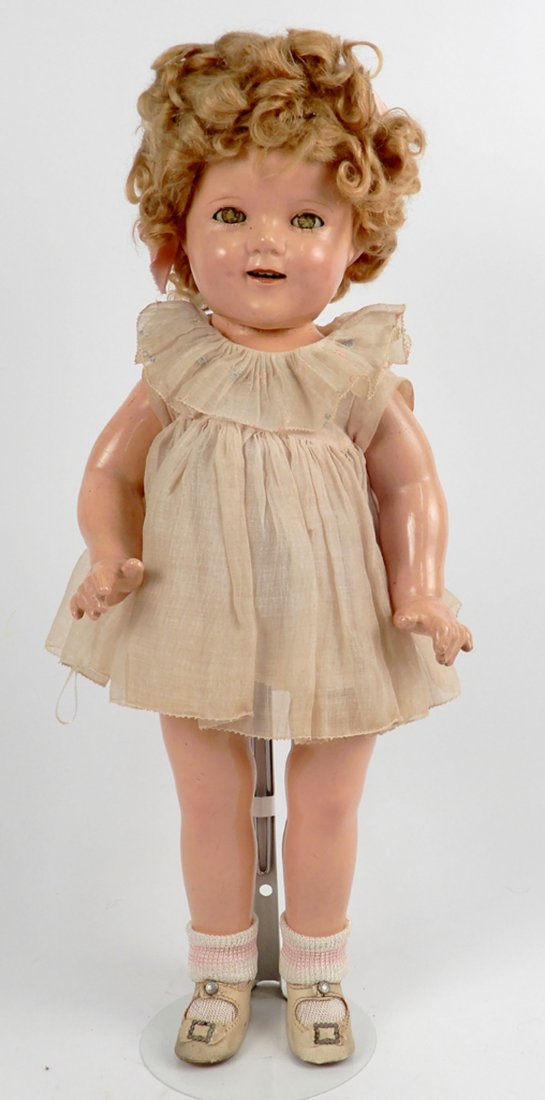 Ideal Shirley Temple composition doll: Ideal Shirley Temple composition doll, jointed composition body, sleep eyes, applied upper lashes, painted lower lashes, eyebrows, open mouth with upper teeth, marked on head "Shirley Temple, 18", mar