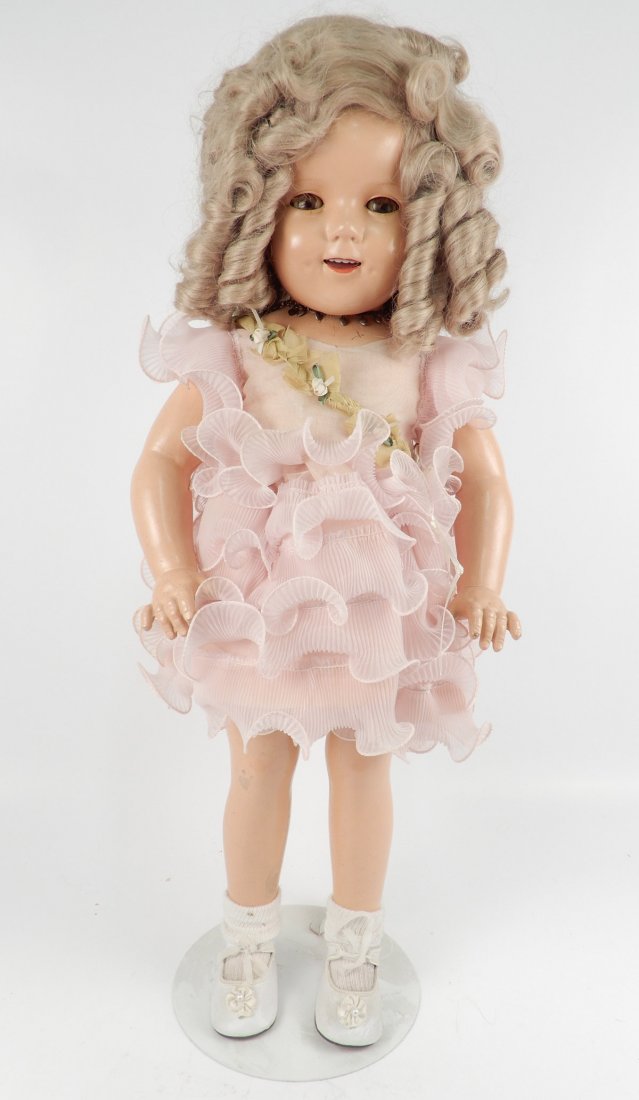 Large Ideal Shirley Temple composition doll, 27" tall,: Large Ideal Shirley Temple composition doll, 27" tall, jointed body, sleep eyes, applied upper lashes, painted lower lashes, open mouth with upper teeth, marked on head Shirley Temple, Ideal, N & T. C