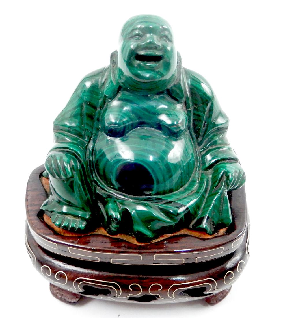 Chinese carved malachite seated Buddha: Chinese carved malachite seated Buddha on wire inlaid wooden stand, 4 1/4" high with stand