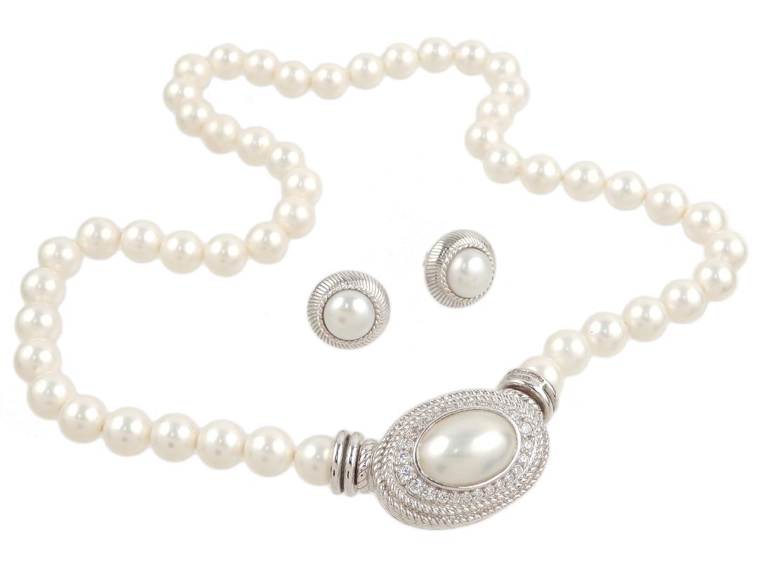 Judith Ripka sterling silver faux pearl necklace and: Judith Ripka sterling silver faux pearl necklace and earrings, 17" long necklace with magnetic sterling silver end caps, and 1 1/4" x 3/4" oval pendant with faux pearl and clear CZ accents; round pier