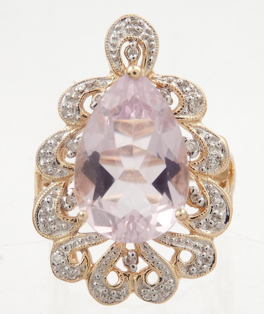 Two tone 14k gold morganite ring: Two tone 14k gold morganite ring, pear shaped light purple color morganite measuring 15mm x 10mm, fancy yellow gold mounting topped with white gold and set with small clear accent stones, size 6.5, we