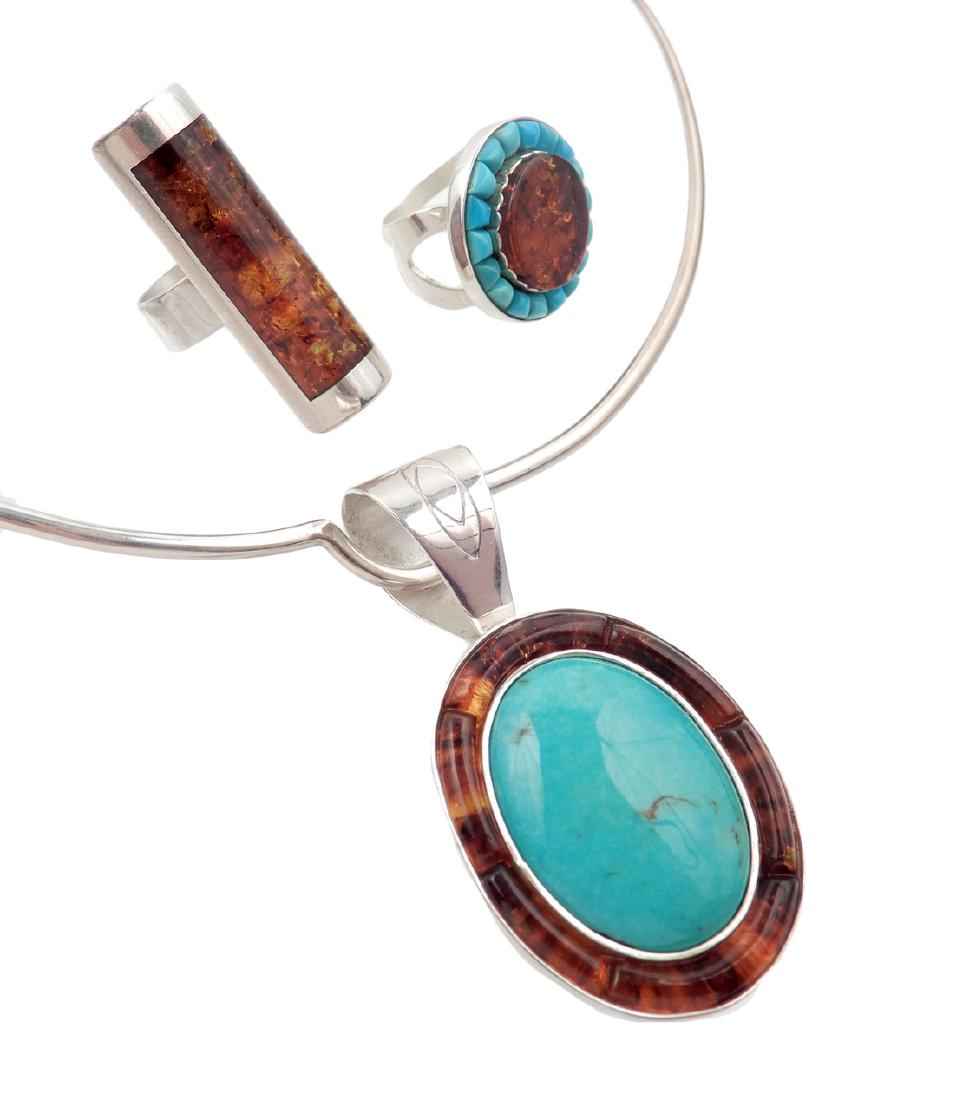 Jay King sterling silver amber necklace and two rings: Jay King sterling silver amber necklace and two rings, collar necklace with 2 1/2" long pendant set with turquoise and amber, 17 1/2" collar with 1" opening, ring with amber center stone surrounded by