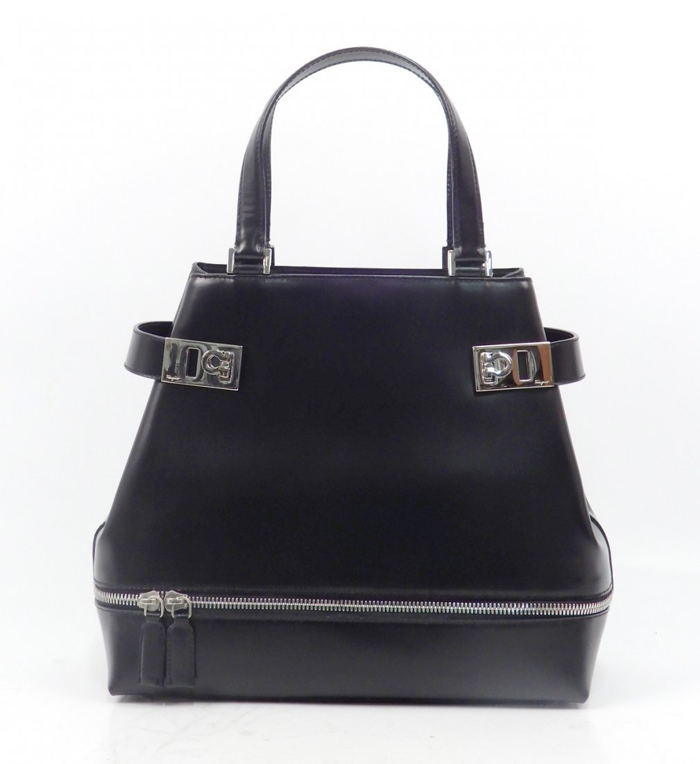 Salvatore Ferragamo black leather purse: Salvatore Ferragamo black leather purse, smooth leather, body measures 11" wide x 9 1/2" long, zippered compartment on bottom, nickel hardware, double handle with 5" drop, stamped inside Salvatore Fer