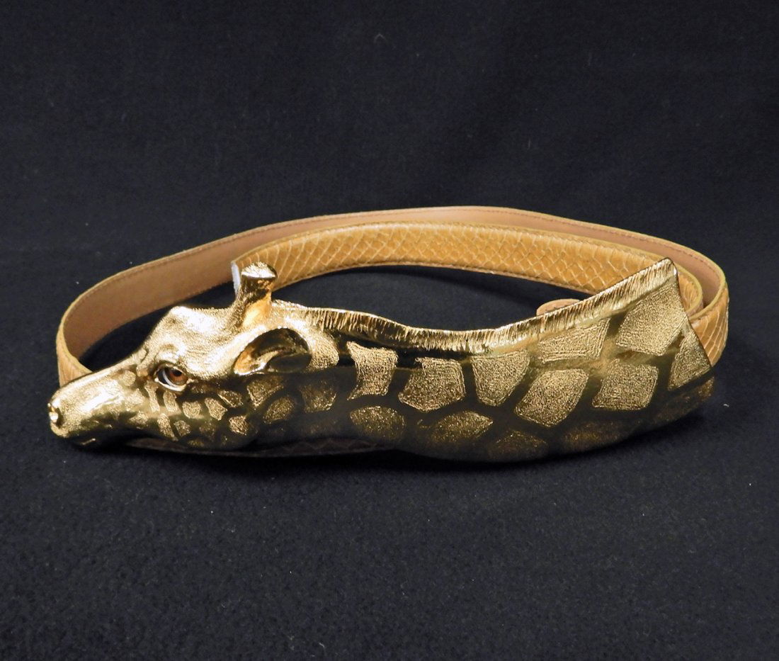 Christopher Ross giraffe head belt: Christopher Ross giraffe head belt, tan snakeskin adjustable belt, 1" wide, wearable length 30" to 40", gold tone giraffe head with glass eye, buckle measures 9" x 2 1/2", signed Christopher Ross 1992