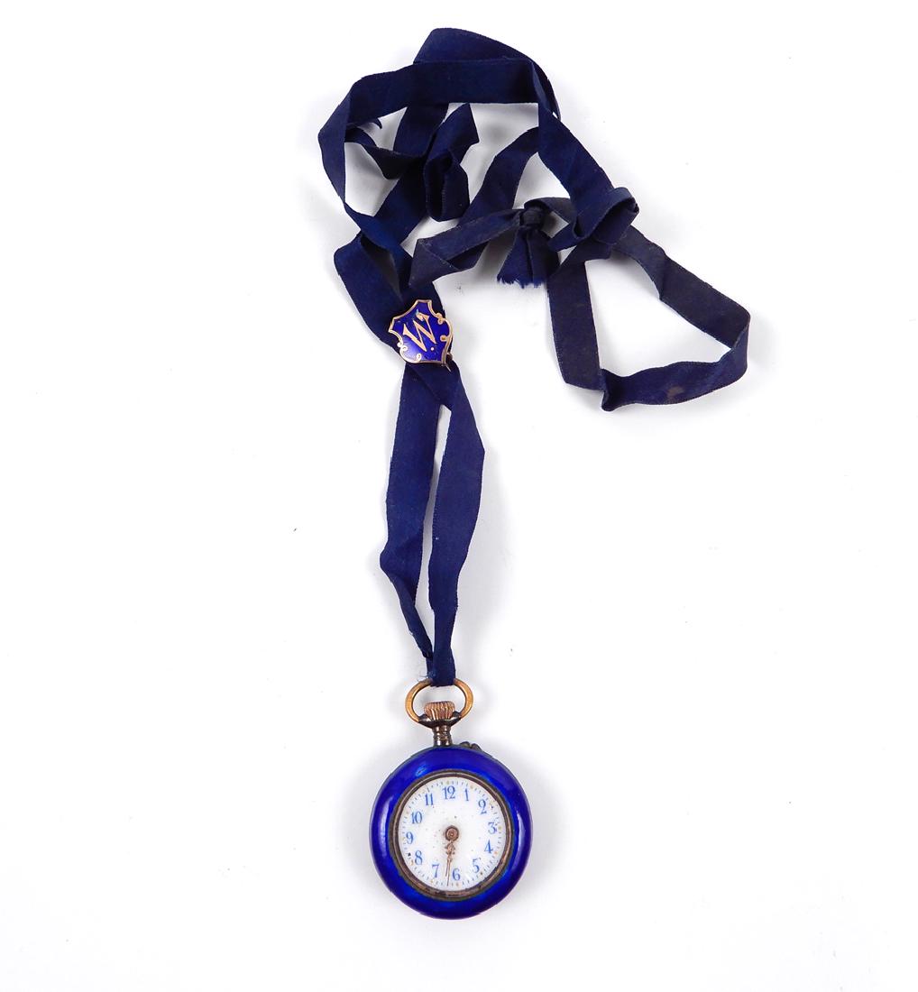 Lady's Swiss 800 silver enameled pendant watch: Lady's Swiss 800 silver enameled pendant watch, 1" diameter, cobalt blue enameling, back of case stamped 0.800 Swiss 55236, hung from satin ribbon with shield shaped enameled pin with initial "W", wei