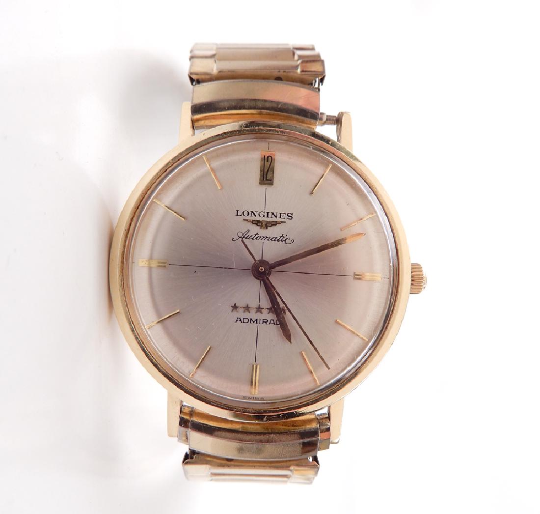Longines Automatic Admiral five star 14k gold: Longines Automatic Admiral five star 14k gold wristwatch, round 14k gold case, 1 5/16" diameter, engraved sentiment on back, stamped 14k Gold, Speidel stretch band, original box, weight 58.8 grams/37.