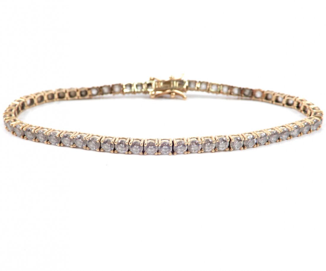 14k gold tennis bracelet: 14k gold tennis bracelet, 7" long x 3.5 mm wide, stamped 14k, weight 8.4 grams/5.4 dwt