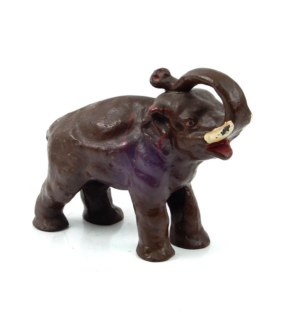 Painted iron elephant doorstop: Painted iron elephant doorstop, 8" x 9" x 3 1/2"