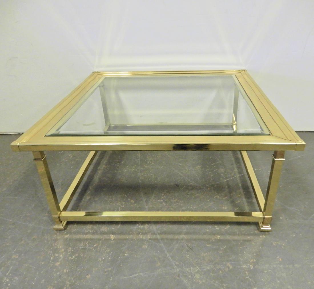 Mastercraft brass and glass cocktail table: Mastercraft brass and glass cocktail table, 16" x 36" square