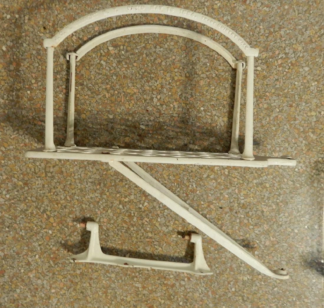 J C N Guibert painted iron hose reel: J C N Guibert painted iron hose reel with wall bracket, 21" x 21" x 6"