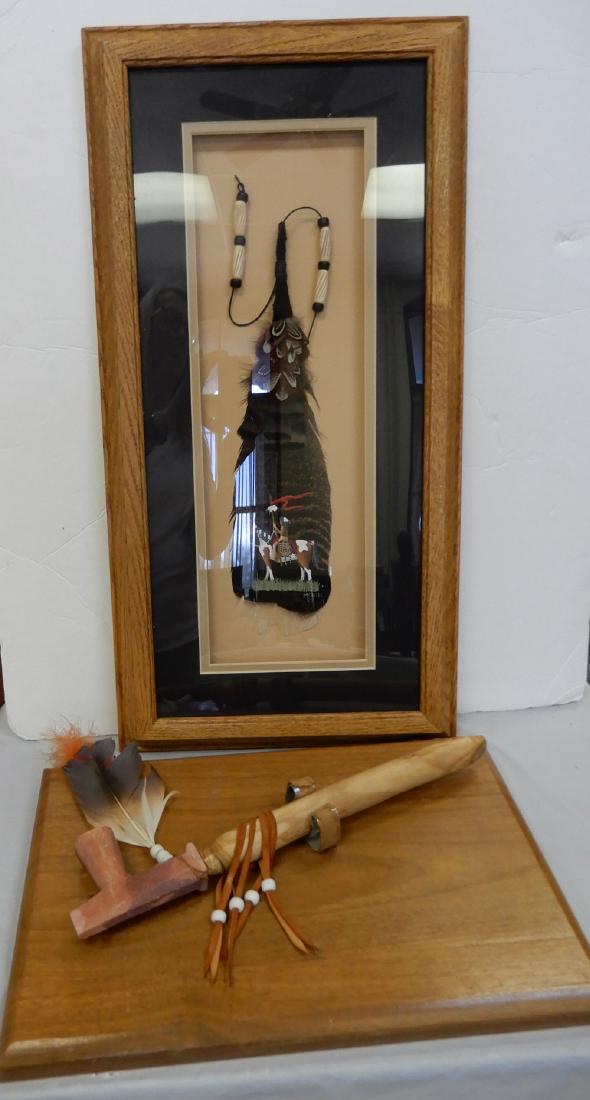 Native American ceremonial peace pipe and painted: Native American ceremonial peace pipe and painted feather, peace pipe mounted on board, painted feather with beading signed McNeel in shadow box frame