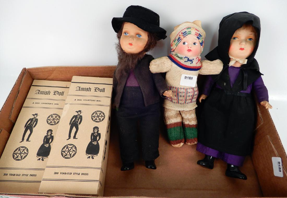 Four Amish dolls and a cloth baby doll: Four Amish dolls and a cloth baby doll, a pair of Amish dolls, 7" in boxes with booklets, a pair of Amish dolls marked Germany 10", and a cloth baby doll, 9"