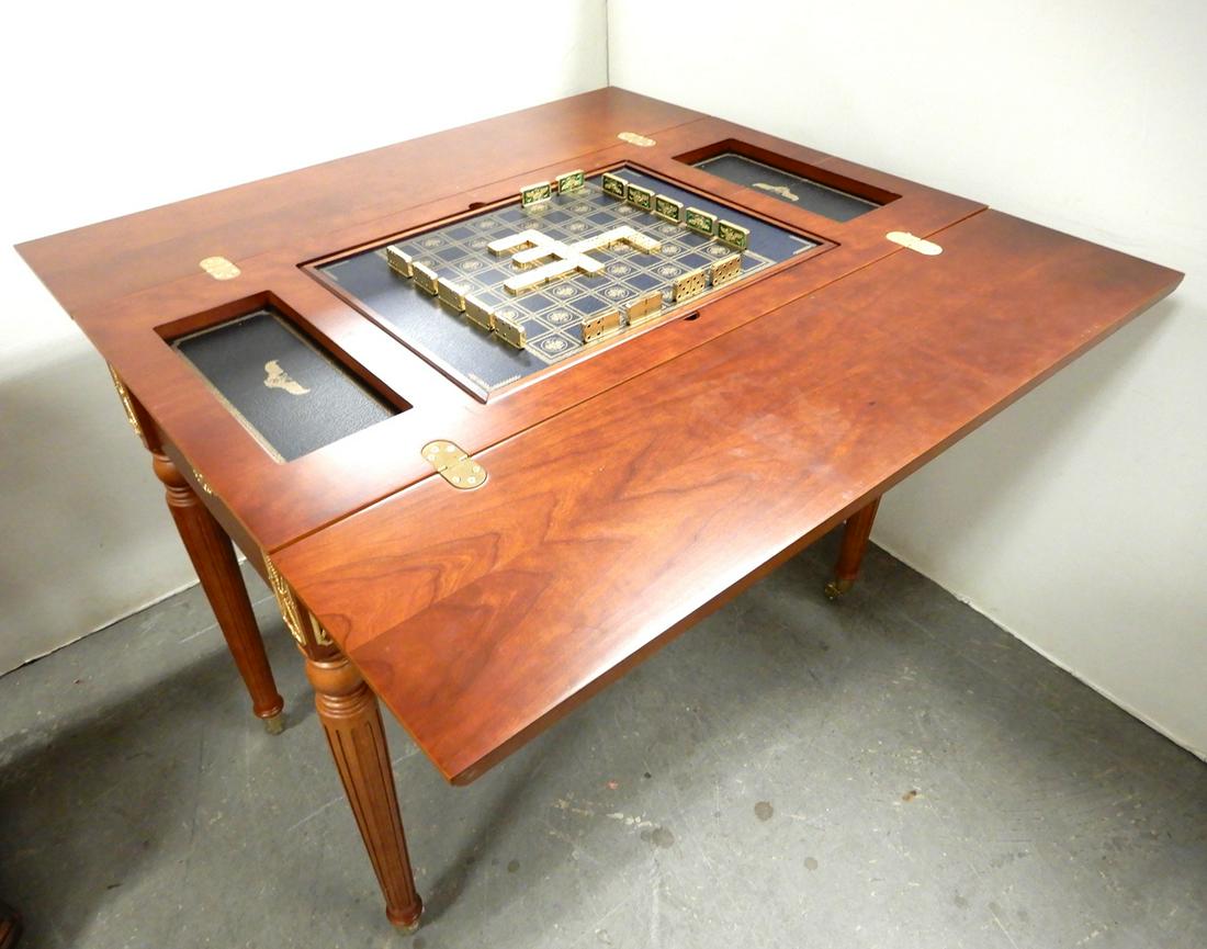 The House of Faberge Imperial 5 in 1 game table by The: The House of Faberge Imperial 5 in 1 game table by The Franklin Mint, cherry finish, on brass castors, limited edition 1166/2000, Franklin Mint metal plaque, with a Franklin Mint chess set, closed 30