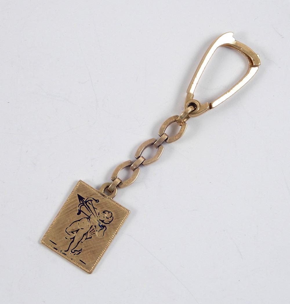 18k gold Cupid key chain (1 of 2)