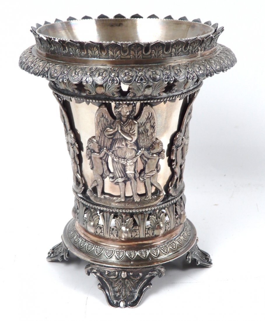Ottoman silver vase and liner: Ottoman silver vase and liner, cast with Grecian angels and cherubs, the liner is stamped Atzhtiph, tests sterling silver, 5 1/2" high x 4 1/2" diameter, 11.890 ozt.