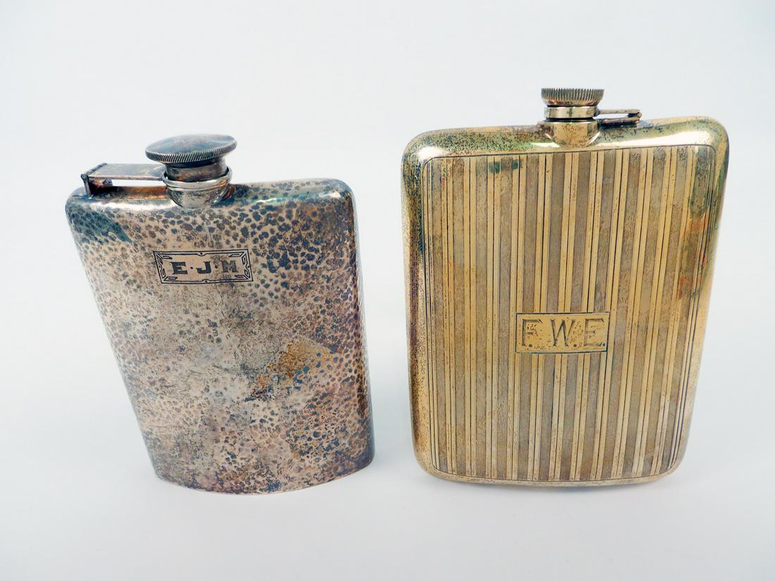 Two sterling silver flasks: Two sterling silver flasks, the first hammered sterling silver engraved E.J.M. on front, stamped International W Sterling 861 3/4 Pint, 6 1/2" x 4 1/2"; and a ribbed sterling flask engraved S. Mac C.S