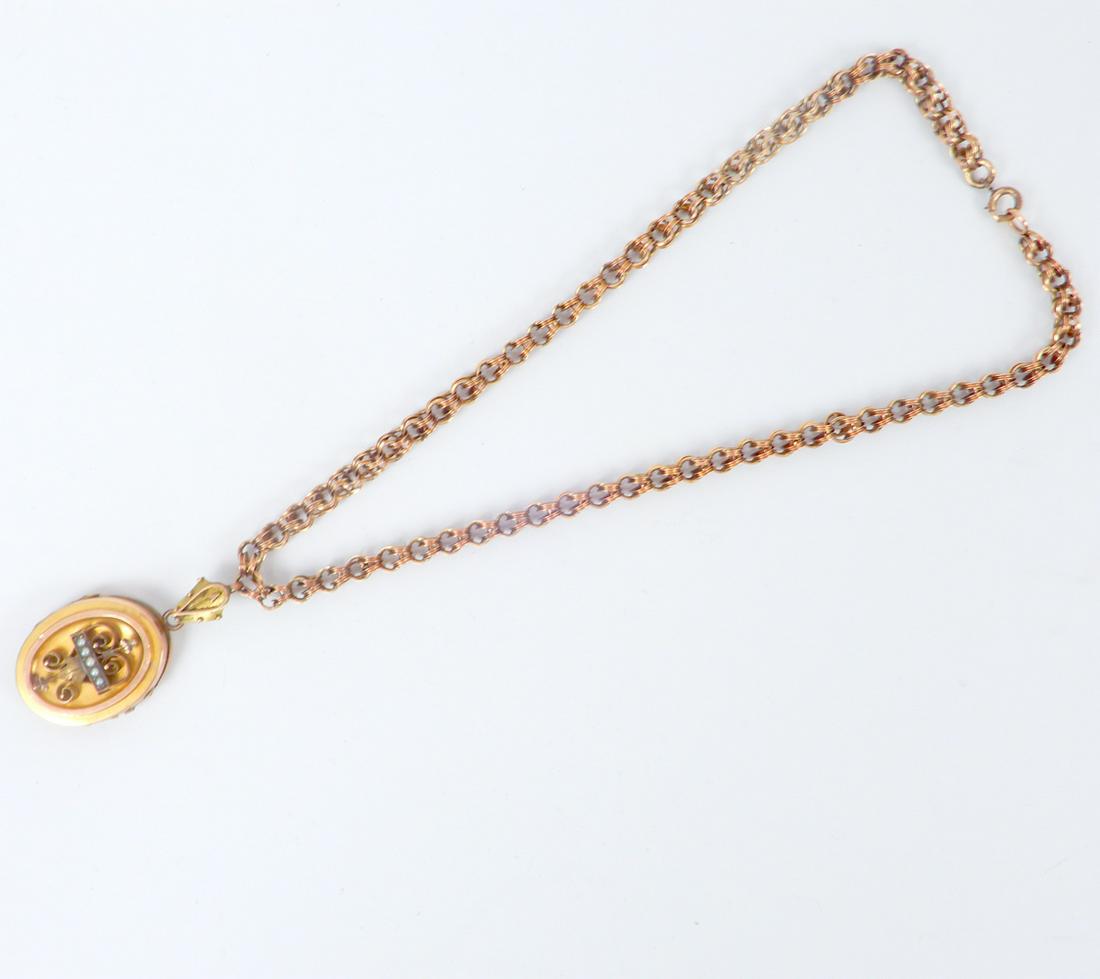 Victorian 10k gold chain with locket: Victorian 10k gold chain with locket, 15" long fancy link chain, 6mm wide, gold filled clasp; gold filled locket measuring 1 3/4" long from top of bale, two vintage photos inside, weight of chain 10.2