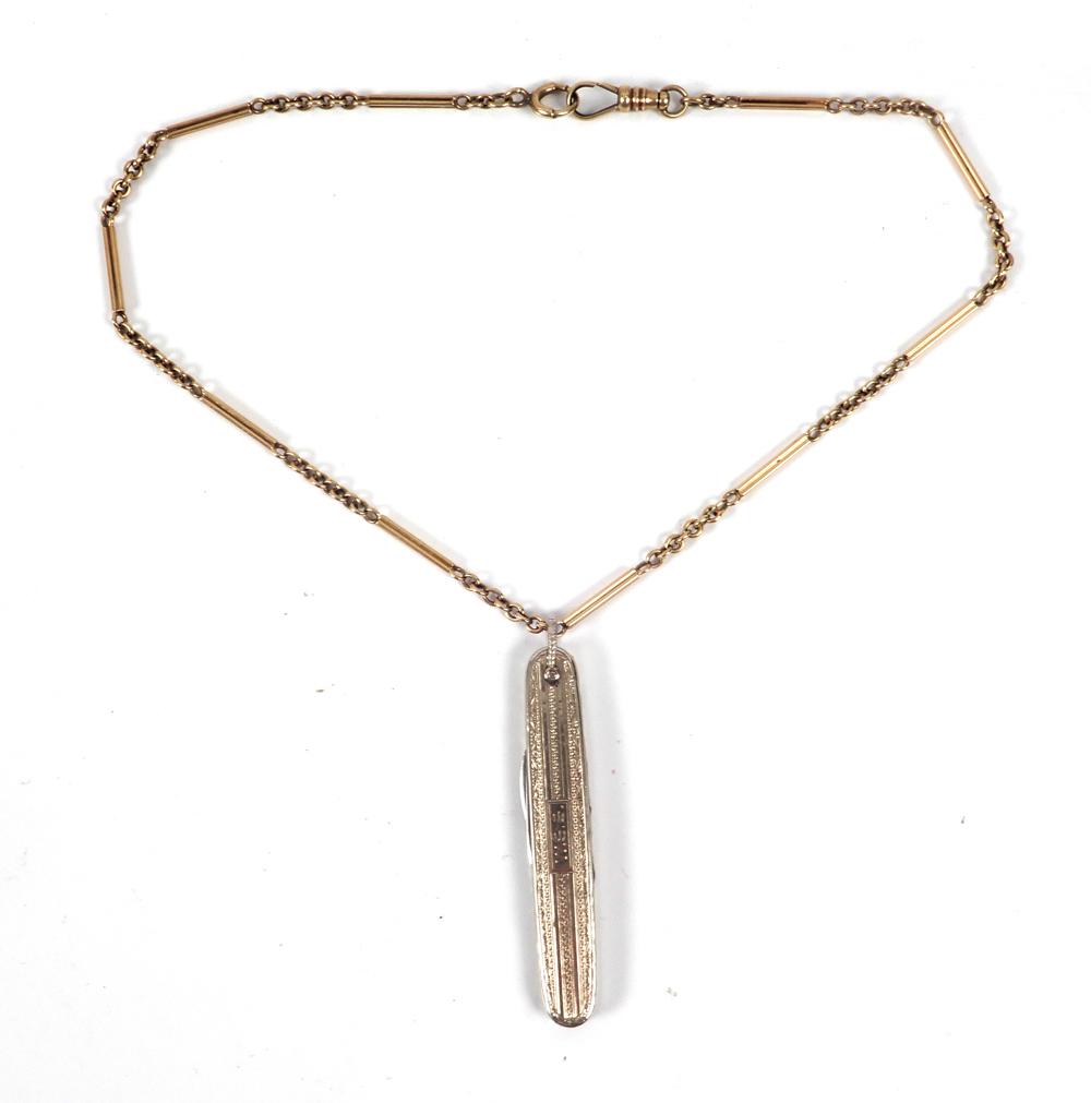 14k gold watch chain and pen knife: 14k gold watch chain and pen knife, fancy link white gold chain, 15" long, stamped 14k, weight of chain only, 14.2 grams/9.0 dwt; white gold cased pen knife with initials W.S.S., stamped 14k