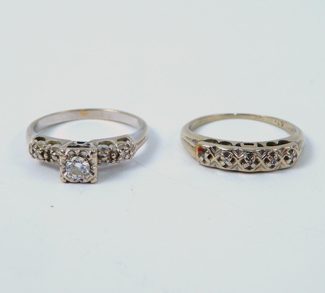 14k white gold diamond wedding ring set: 14k white gold diamond wedding ring set, engagement ring is set with one round diamond measuring approximately 0.15 carats, diamond accents on both rings, stamped 14k Starfire, size 6.5, weight 5.2 gr