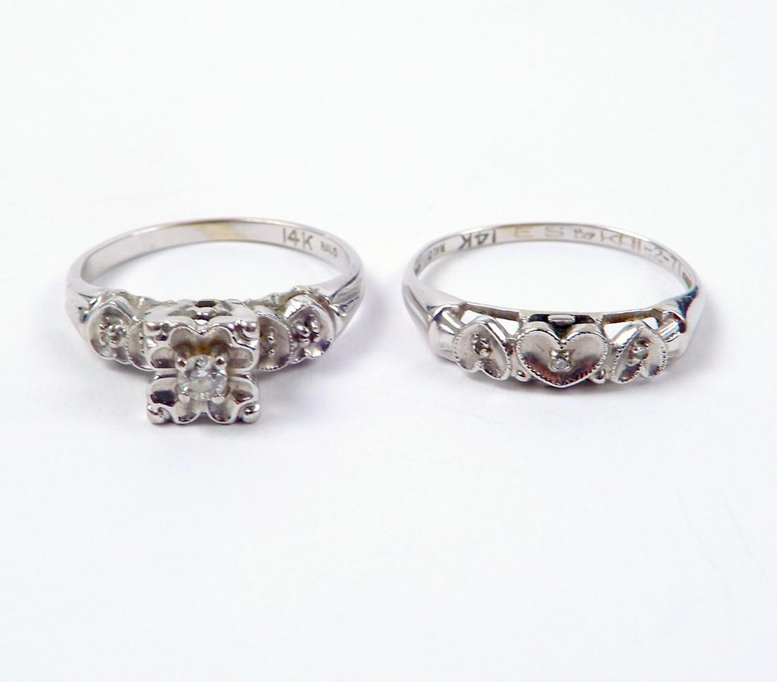 14k white gold diamond wedding ring set: 14k white gold diamond wedding ring set, heart design, engagement ring is set with one round diamond measuring approximately 0.10 carats, diamond accents on both rings, stamped 14k Kalo, size 6, weigh
