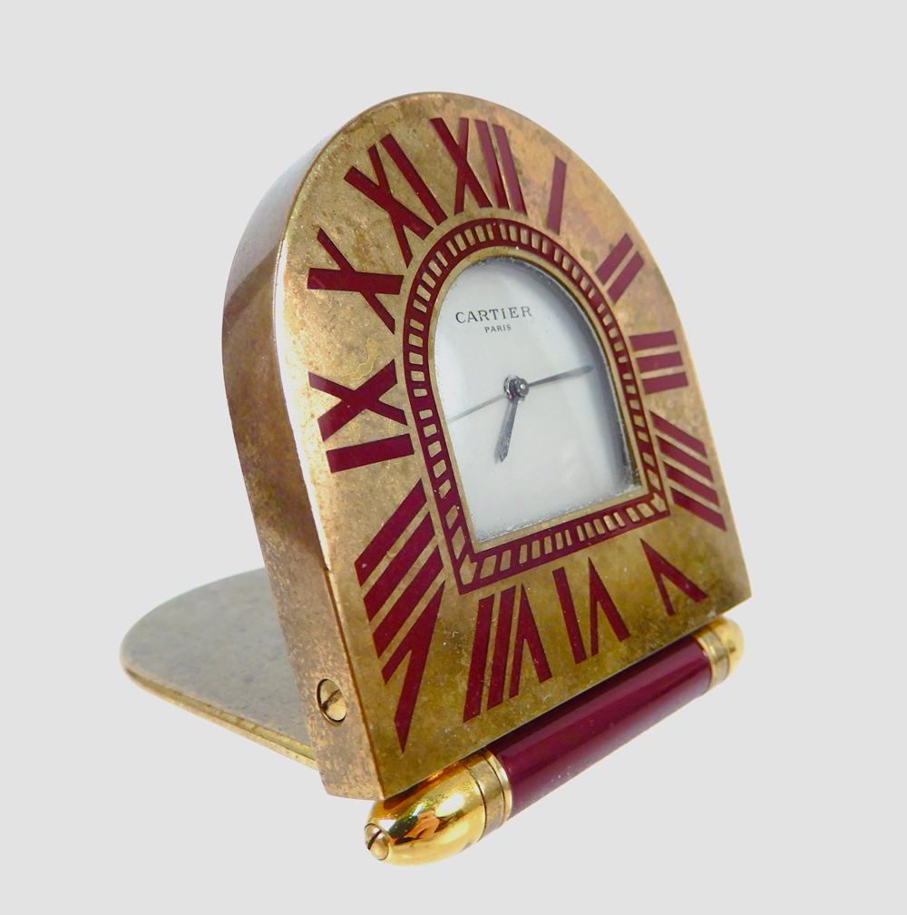 Cartier Art Deco style dresser clock: Cartier Art Deco style dresser clock, folding cover, dark red Roman numerals, 2 1/4" high x 1 7/8" wide, quartz movement, signed Cartier Paris, quartz, Made in France, 357201588