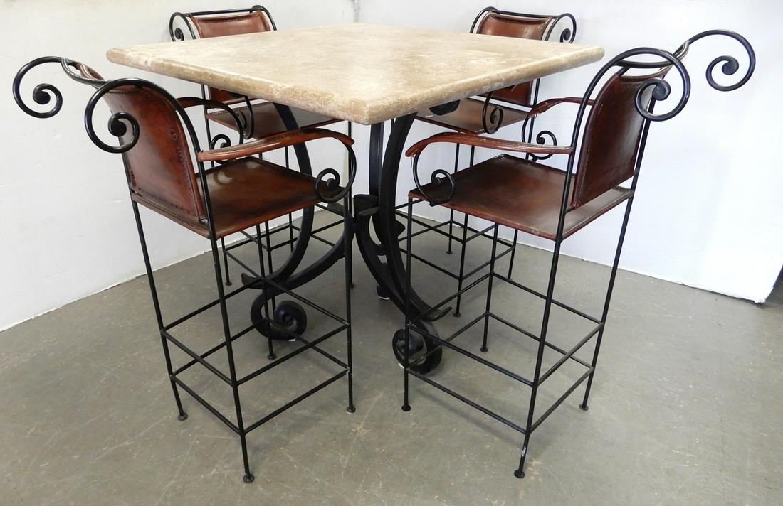 Wrought iron five piece pub set: Wrought iron five piece pub set, table has beveled travertine marble top, chairs have stitched leather backs and seats chairs 45" high